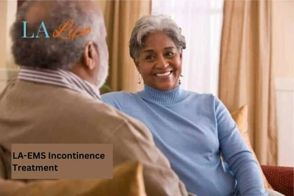 Couple sat smiling at each other - LA-EMS treatment Greater London (Bromley)