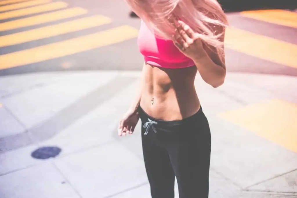 Woman with toned stomach after LA-EMS Body Sculpting Treatment Greater London (Bromley)